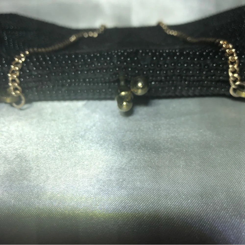 Antique vintage black beaded purse with chain handle.